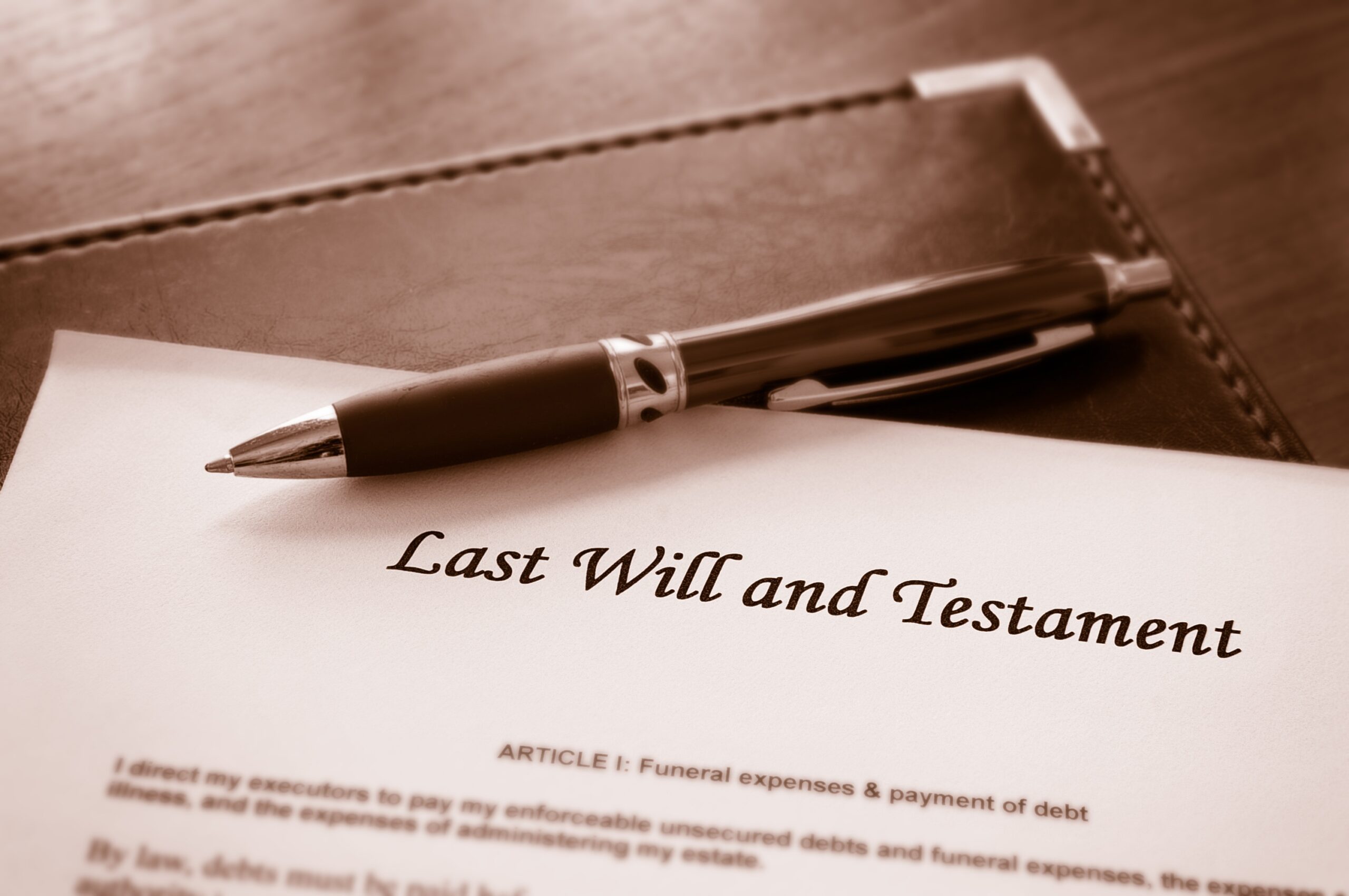 last will and testament with pen