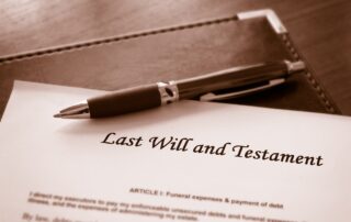 last will and testament with pen