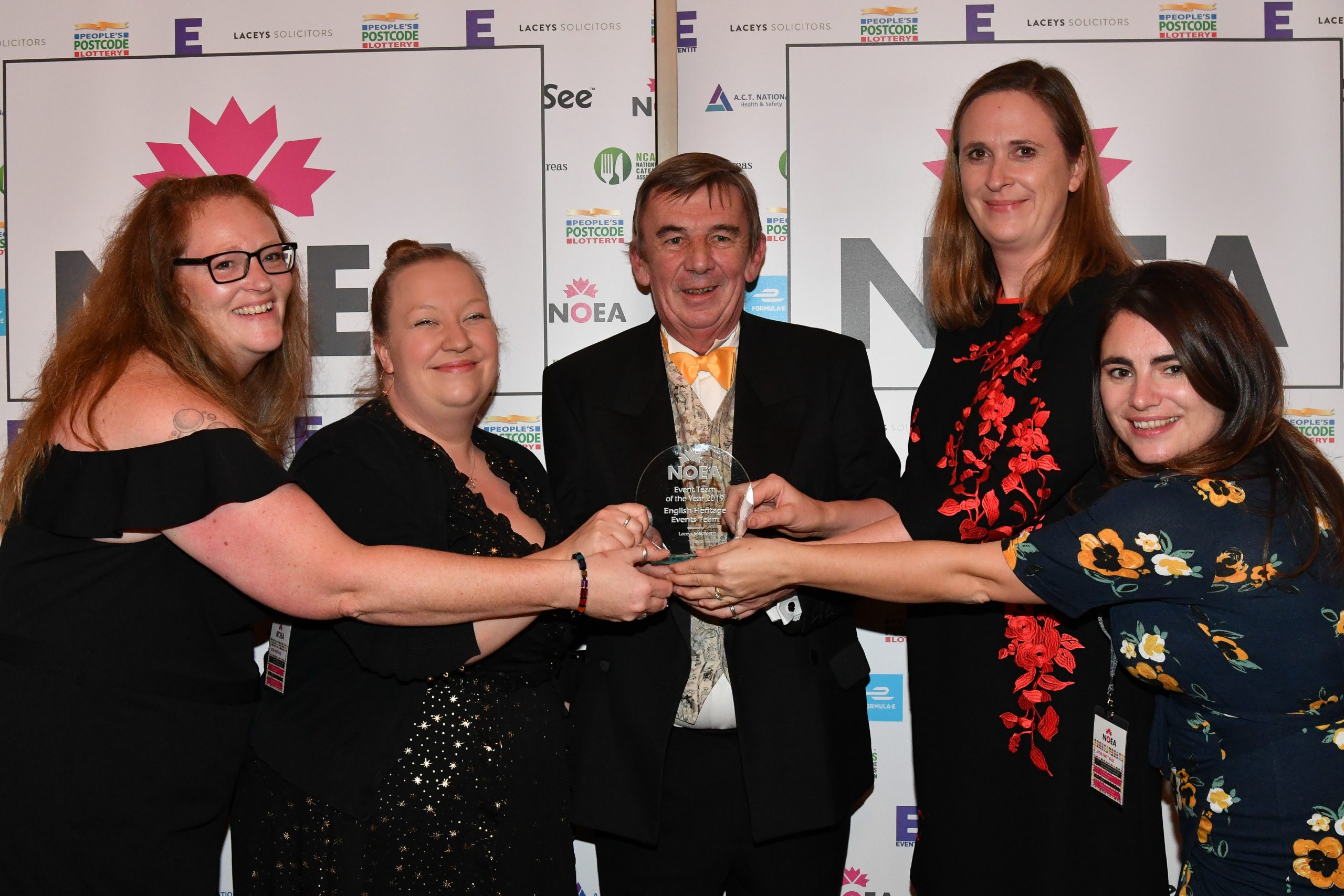 Philip Day and the team at English Heritage Events holding the Events Team of the Year award