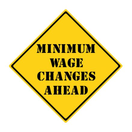 minimum wage changes ahead sign