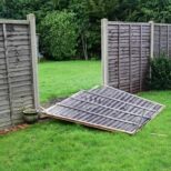 fences blown over in storm